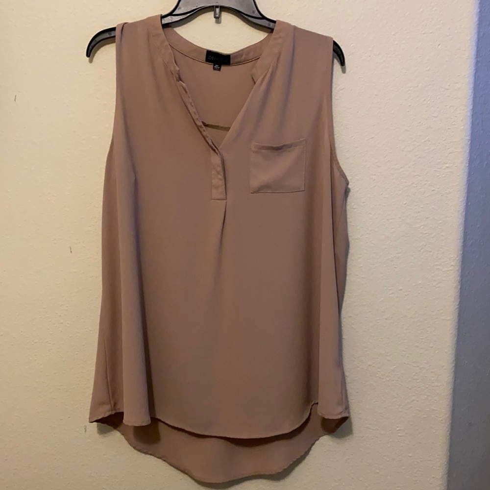 Tan sleeveless blouse